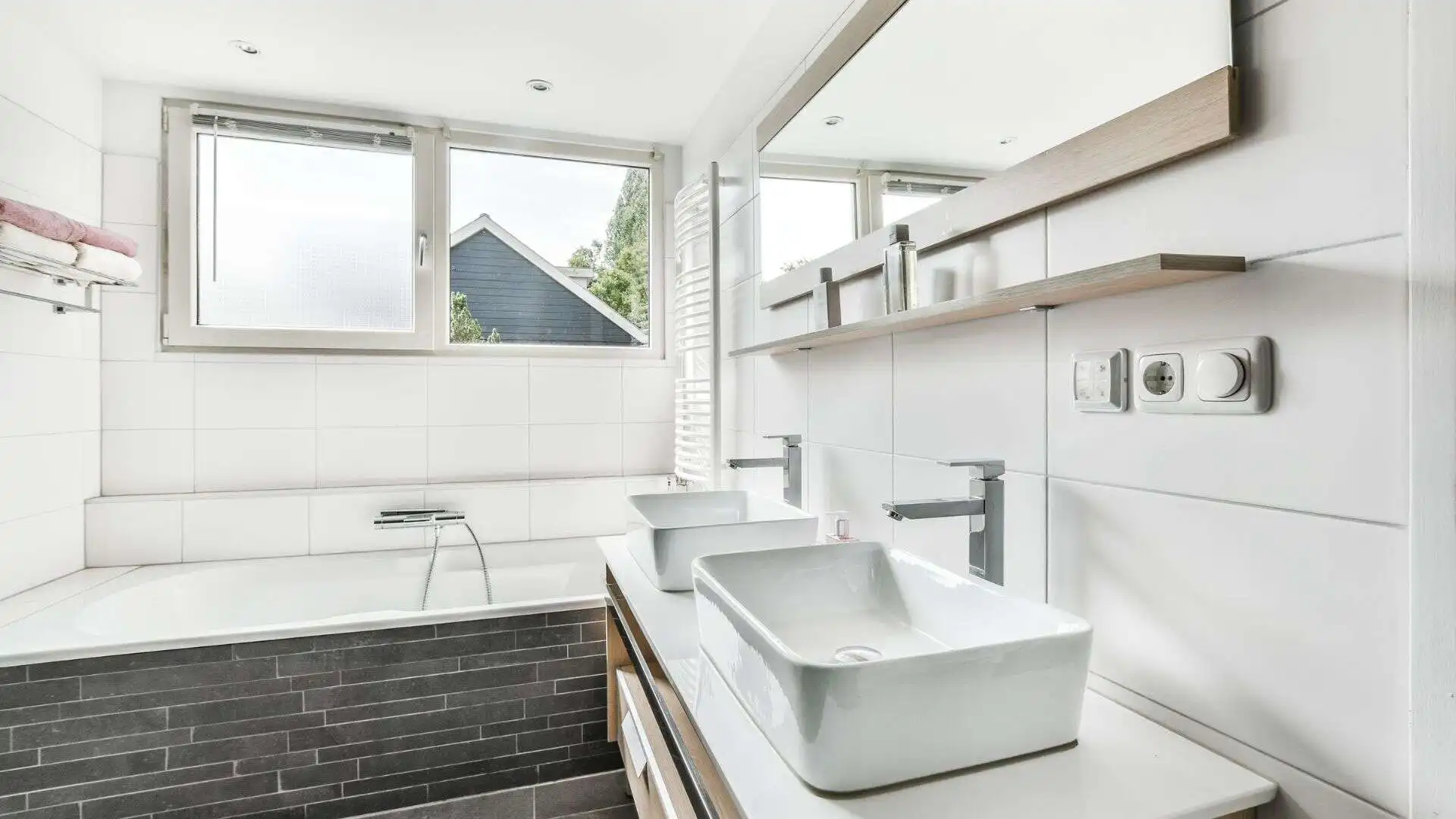 Renovated bathroom with a tiled walk-in shower